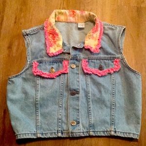 ONE OF A KIND ruffled floral denim vest